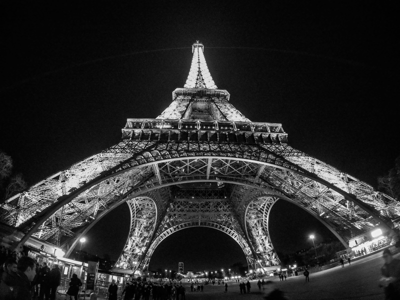 architecture, clear sky, travelling, spire, illuminated, tower, sky, photoholgic, building exterior, black and white, tourism, low angle view