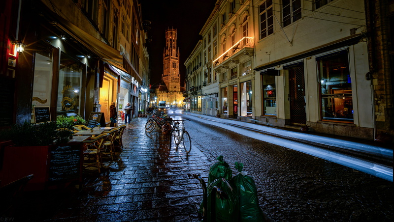 the way forward, cobblestone, wet, alleyway, incidental people, cafe, built structure, alley, city, town, architecture, road, nature, diminishing perspective