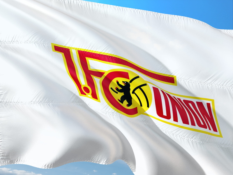 warning sign, wind, white color, day, low angle view, 4K, outdoors, flag, communication, environment, sign, textile, fc union berlin, 1, sunlight, text