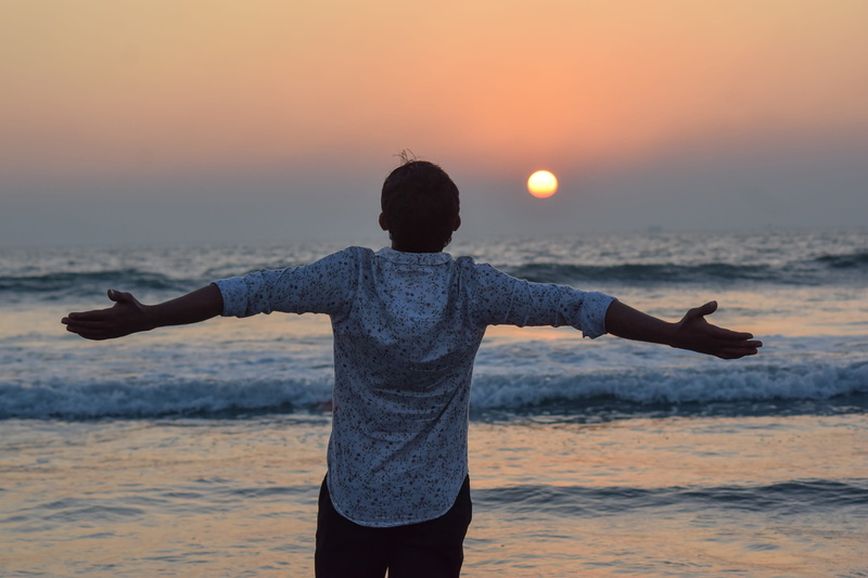 land, outdoors, rear view, orange color, sand, beauty in nature, dhaka, holiday, people, three quarter length, lifestyles, sky, scenics - nature, vacation