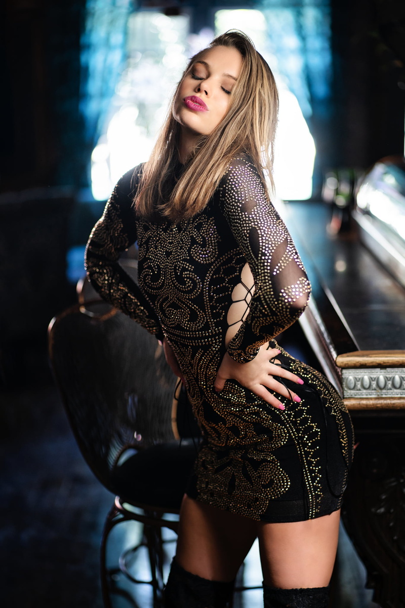 women indoors, blonde, closed eyes, chair, glamour, Christopher Rankin, indoors, portrait display, bar, knee-high boots, women, model, pink lipstick, portrait