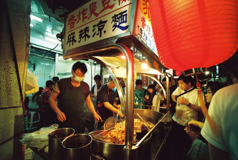 area, cafeteria, apron, arcade game machine, wearing, night, red, adult, large group of people, shop, city life, market, women, black, architecture, standing