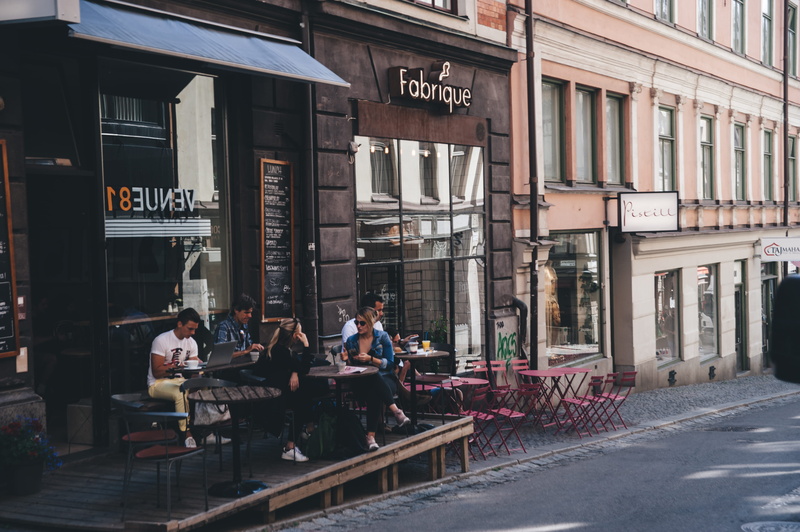 seat, building, leisure activity, food court, day, group of people, outdoors, people, meal, women, chair, human, street, asphalt, urban, food, restaurant