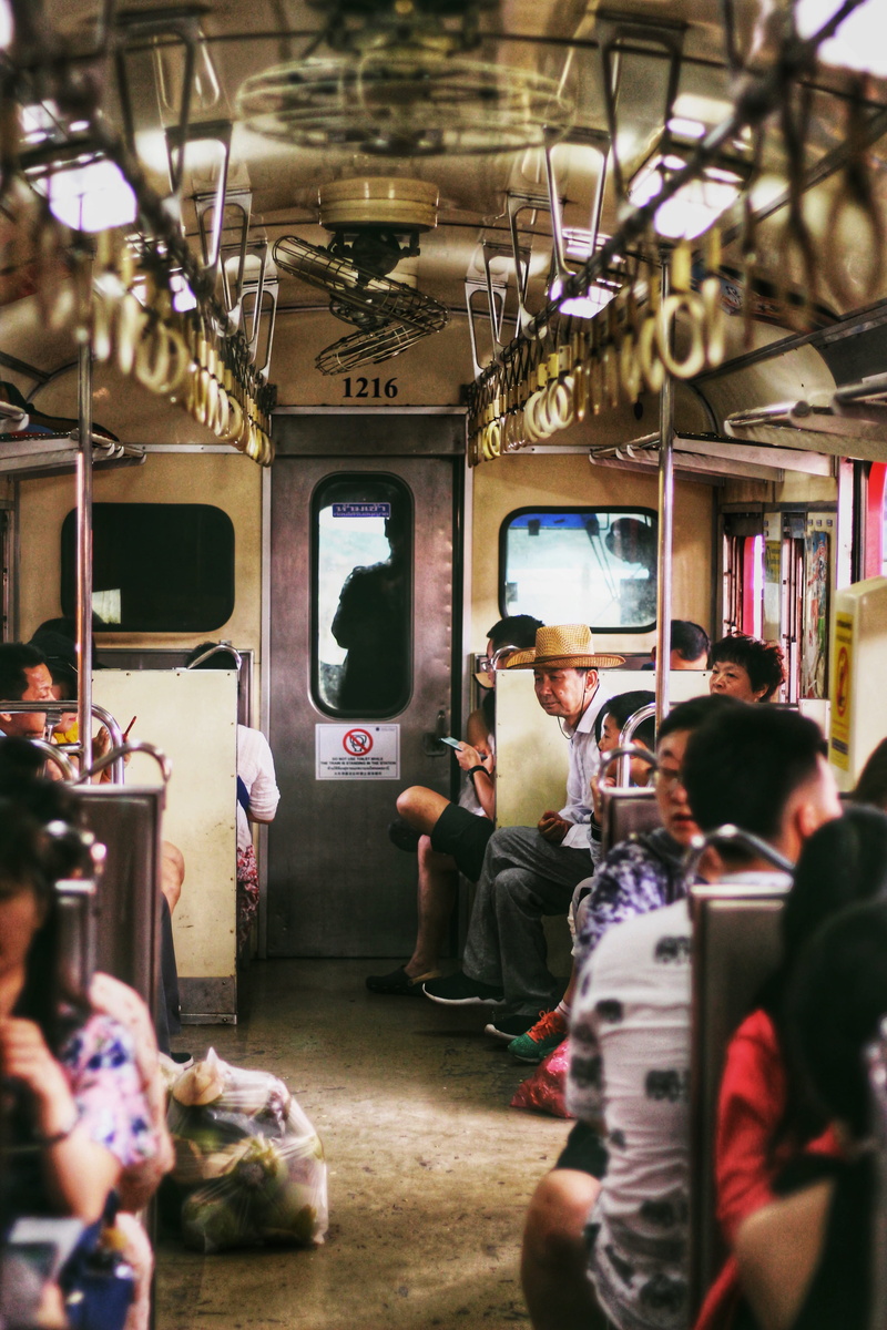 crowd, person, human, transportation, people, passenger, inside, meal, group, train, mode of transportation, vehicle, rail transportation, food, worker