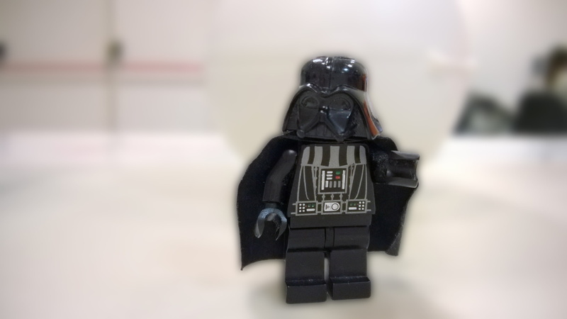 LEGO, indoors, selective focus, weapon, darth, law, photographer, technology, protection, government, people, focus on foreground, 2K, black color, wars