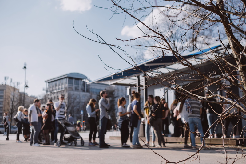 women, group of people, 5K, architecture, built structure, tree, twig, real people, stand, sunny, crowd, lifestyles, street, city, sky, up, adult, nature