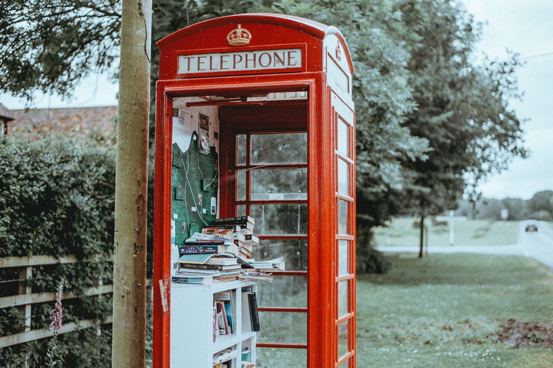focus on foreground, technology, box, architecture, convenience, phone box, outdoors, built structure, garden, cabina telefónica, library, tree, global communications