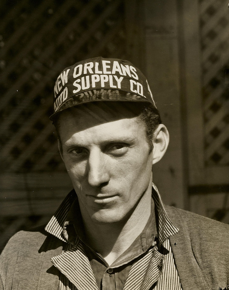 uniform, mid adult, man, lifestyle, 2K, government, vintage, young men, street, cap, focus on foreground, sepia, portrait, day, clothing, 1930s, mechanic