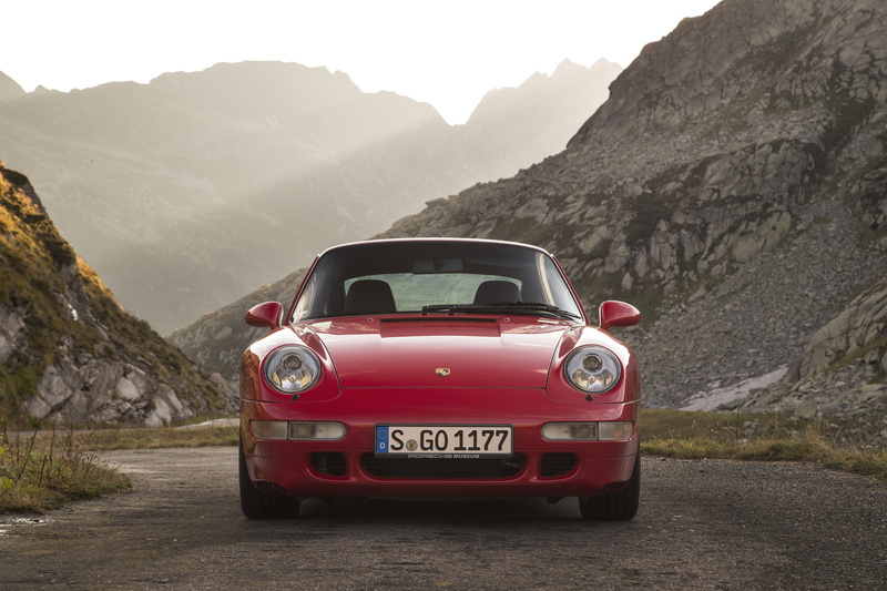 red, non-urban scene, landscape, formation, porsche, 911, outdoors, rock, 1995, real people, land vehicle, transportation, car, turbo, mountain range, idyllic