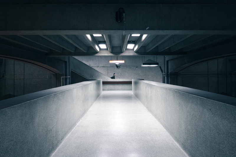 light, indoors, 4K, flooring, no people, illuminated, wall - building feature, concrete, empty, parking garage, modern, hallway, parking lot, tunnel, diminishing perspective