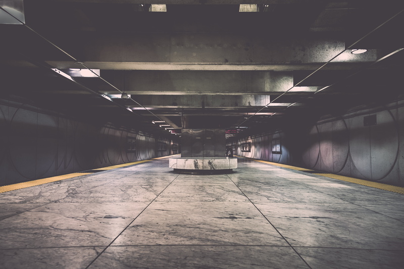 ceramic, indoors, fluorescent light, parking lot, direction, tile, surface level, illuminated, tiled floor, absence, underground walkway, diminishing perspective