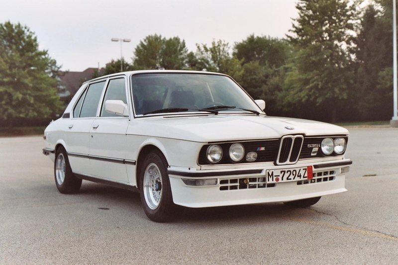 outdoors, no people, retro styled, motor vehicle, white cars, tree, vintage car, BMW, day, car, focus on foreground, land vehicle, sedan, nature, 720P