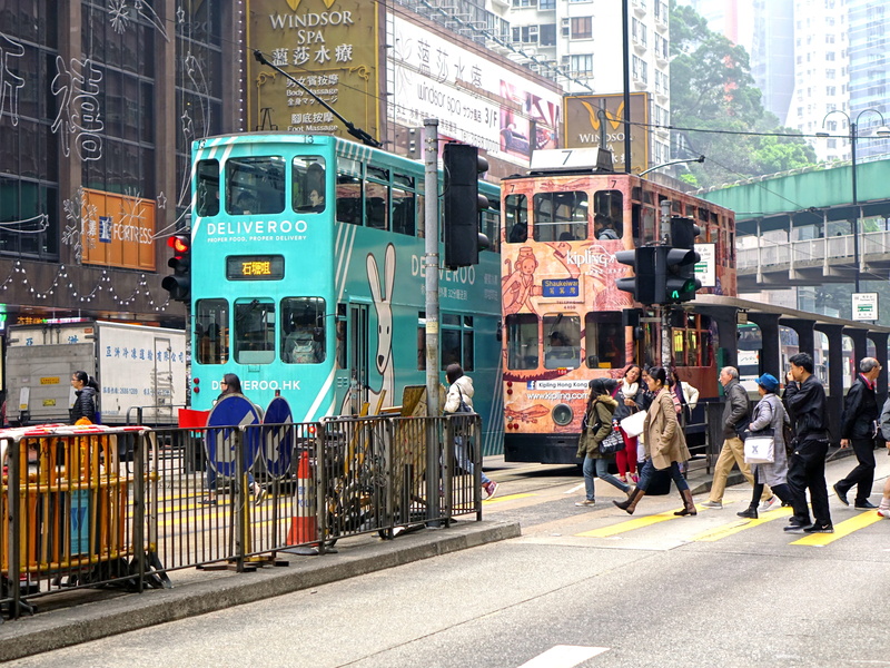 real people, adult, street, road, urban city, tram, walking, city, people, urban, group of people, crowd, transportation, city life, crossing, outdoors