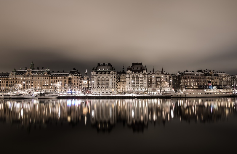 sea, famous Place, skycraper, illuminated, travel destinations, water, house, architecture, building, reflection, no people, still, cloud - sky, sweden
