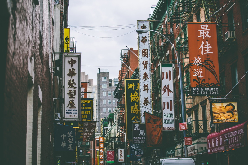 non-western script, information sign, architecture, street, advertisement, sign, building exterior, urban, residential district, script, no people, skyscraper