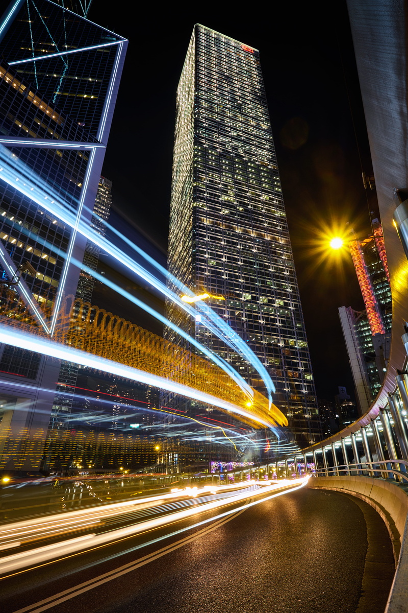 blurred motion, dark, building exterior, tall - high, light, night, city, skyscraper, hong, building, outdoors, 5K, high, travel destinations, speed, motion