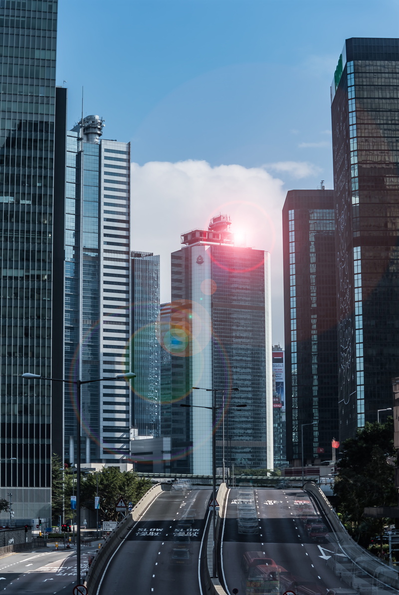 land vehicle, motor vehicle, architecture, buildings, metropolis, outdoors, building, cityscape, downtown, building exterior, built structure, high rise