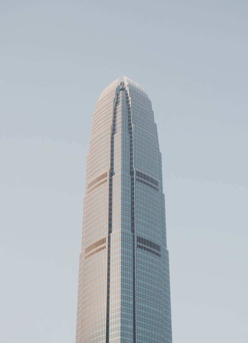 clear sky, travel destinations, no people, architecture, tall - high, financial district, hong kong, central, building, office, low angle view, city, day