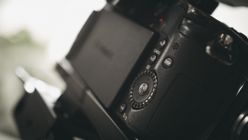 day, indoors, 5K, cameragear, mirrorlesscamera, lumixcamera, dannyfeng, camerarig, black color, retro styled, communication, close-up, history, business