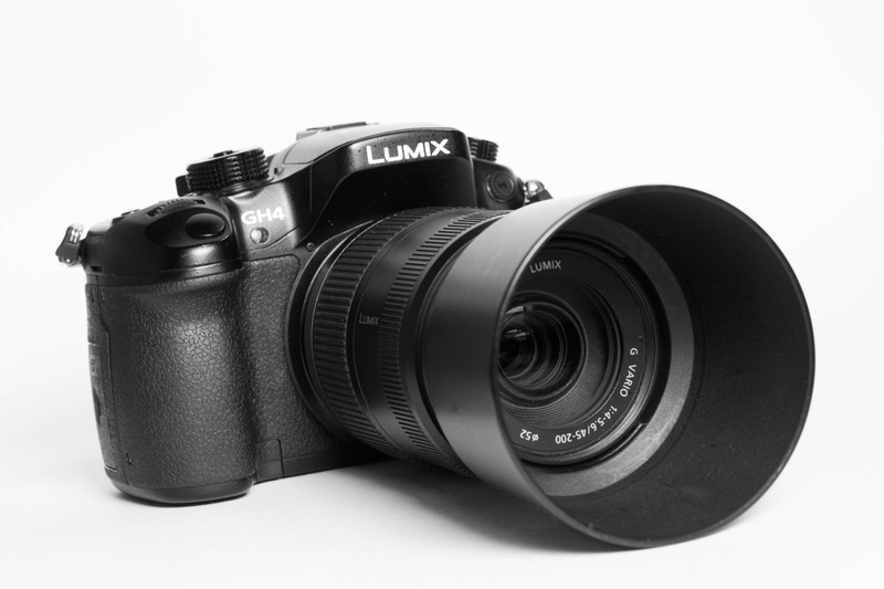 Dslr, micro four third, studio shot, technology, no people, equipment, cut out, black color, activity, black, gh4, modern, retro styled, lens - optical instrument
