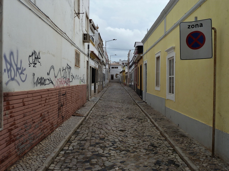 no parking, rose, architecture, cloud - sky, sky, wall - building feature, no people, old town, transportation, diminishing perspective, communication