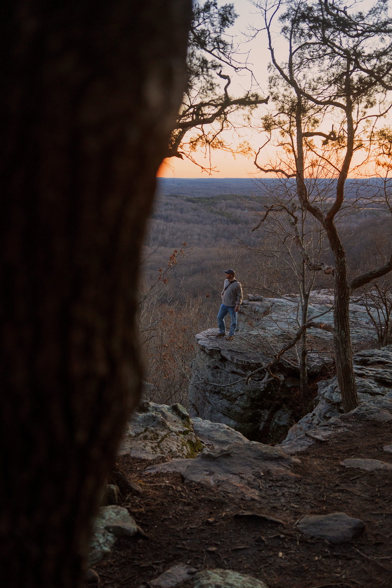 outdoors, full length, people, beauty in nature, tranquility, trees, nature, sky, trunk, shawnee, earth, tree, tones, rock - object, national, garden of the gods recreation area