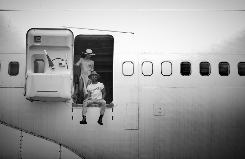 casual clothing, mode of transportation, travel, girls, sister, rail transportation, two people, fashion, leisure activity, vacation, monochromatic, lifestyles
