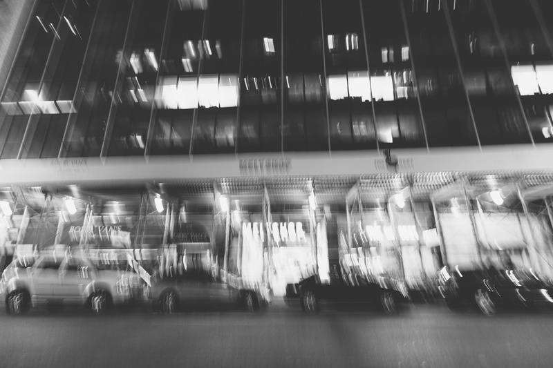 city, night, architecture, transparent, blurred motion, built structure, consumerism, out of focus, transportation, united states, glass - material, indoors