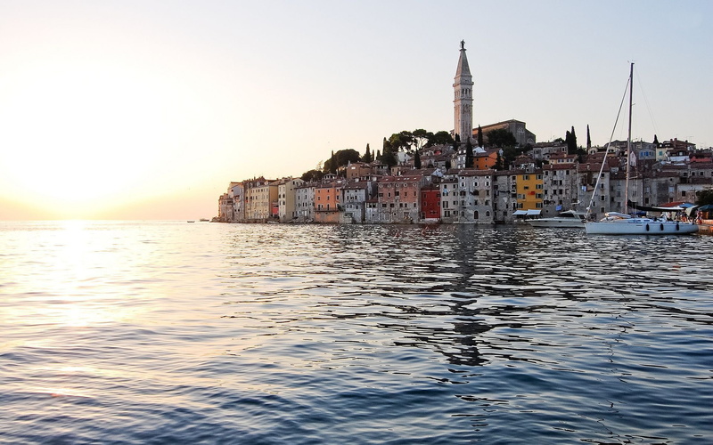 building exterior, cityscape, waterfront, water, sunset, nautical vessel, city, transportation, sea, clear sky, rovinj, outdoors, religion, architecture