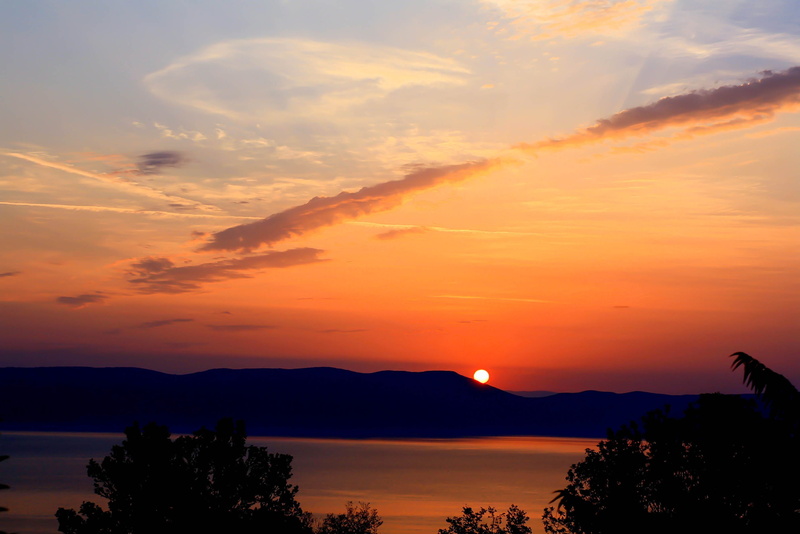 beauty in nature, romantic sky, cloud - sky, mountain, idyllic, no people, sky, island, tree, croatia, water, dawn, orange color, silhouette, sunset, tranquil scene