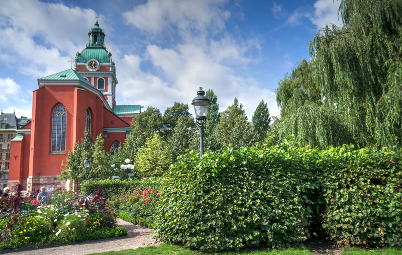 built structure, place of worship, red, europe, town, green color, no people, outdoors, tower, building exterior, scenery, garden, plant, building, scenic