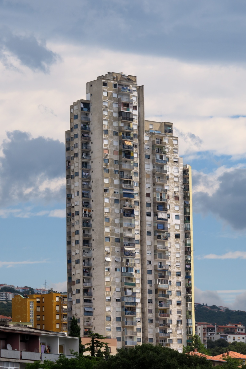 cloud - sky, city, croatia, low angle view, rijeka, residential district, built structure, tall - high, sky, cityscape, building, skyscraper, building exterior