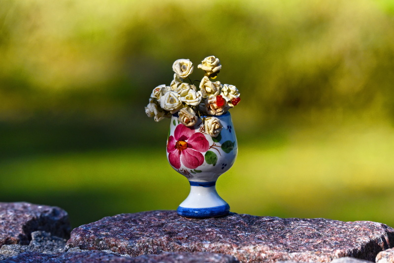 rock, representation, selective focus, brown, close-up, flower, floral, creativity, flowering plant, focus on foreground, outdoors, nature, rock - object