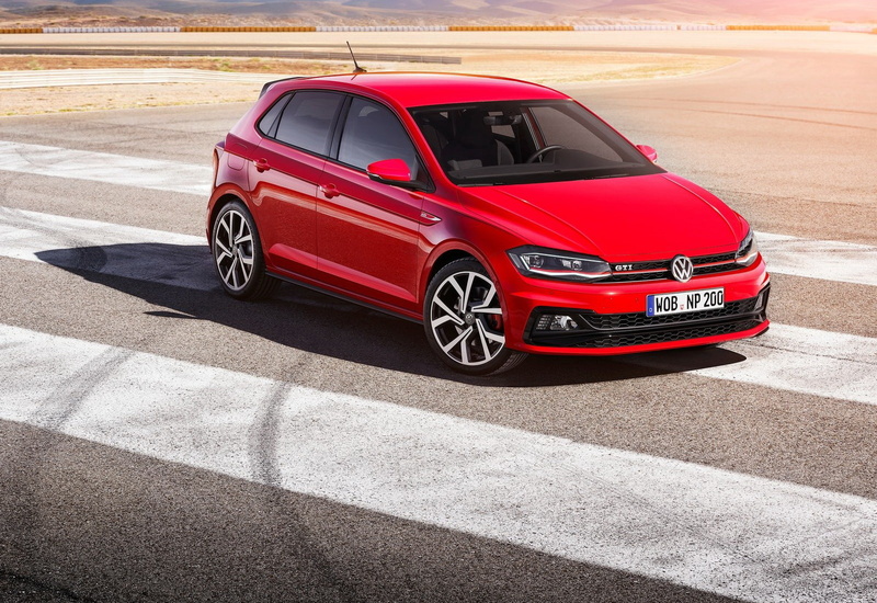 gti, car, sign, road marking, nature, transportation, shadow, city, mode of transportation, volkswagen, motor vehicle, sunlight, polo, red, road, street