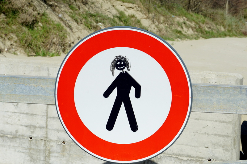geometric shape, warning sign, day, close-up, red, guidance, outdoors, human representation, information sign, sign, no people, funny, shape, symbol, road sign