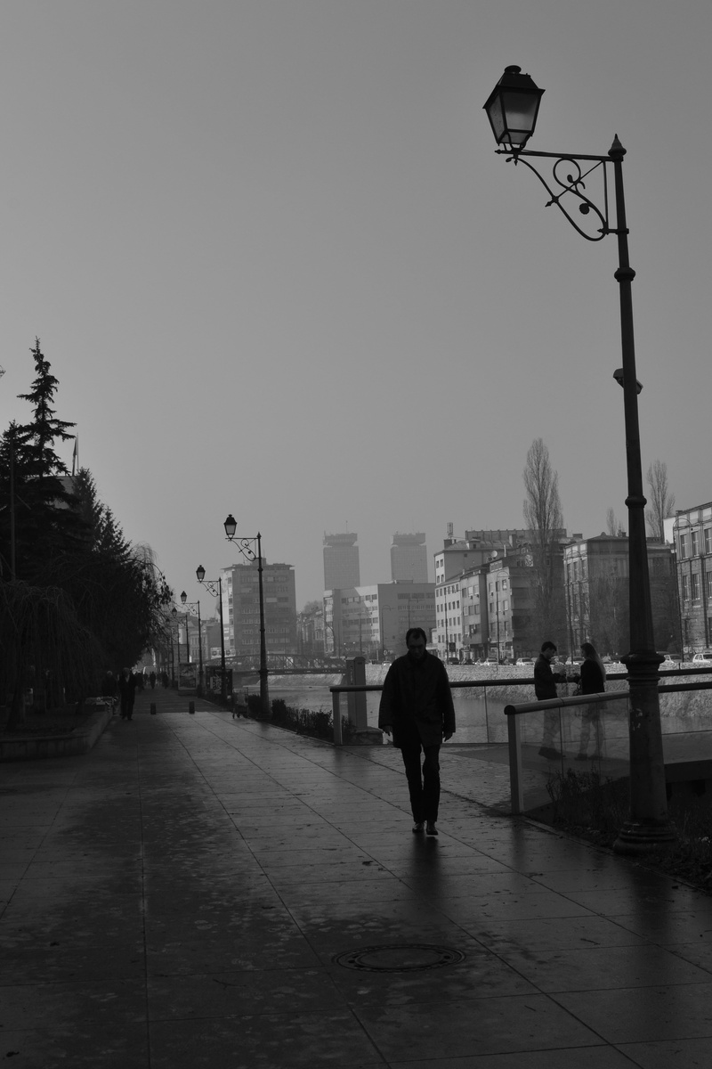 lifestyles, sky, lighting equipment, rain, black and white, full length, outdoors, rainy season, one person, 4K, street, nature, footpath, building exterior
