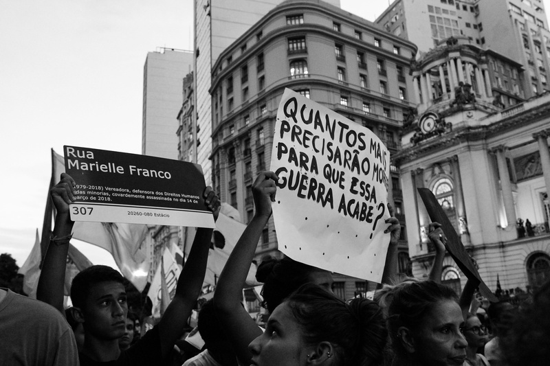 people, building, banner - sign, protests, vehicle, large group of people, placard, resist, message, rio de janeiro, aggression, street, group of people