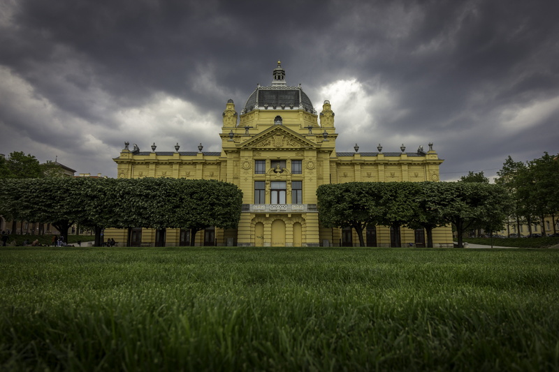 built structure, high contrast, outdoors, grass, 5K, art pavilion zagreb, ominous, no people, zagreb, growth, field, government, art pavilion, tree, green color
