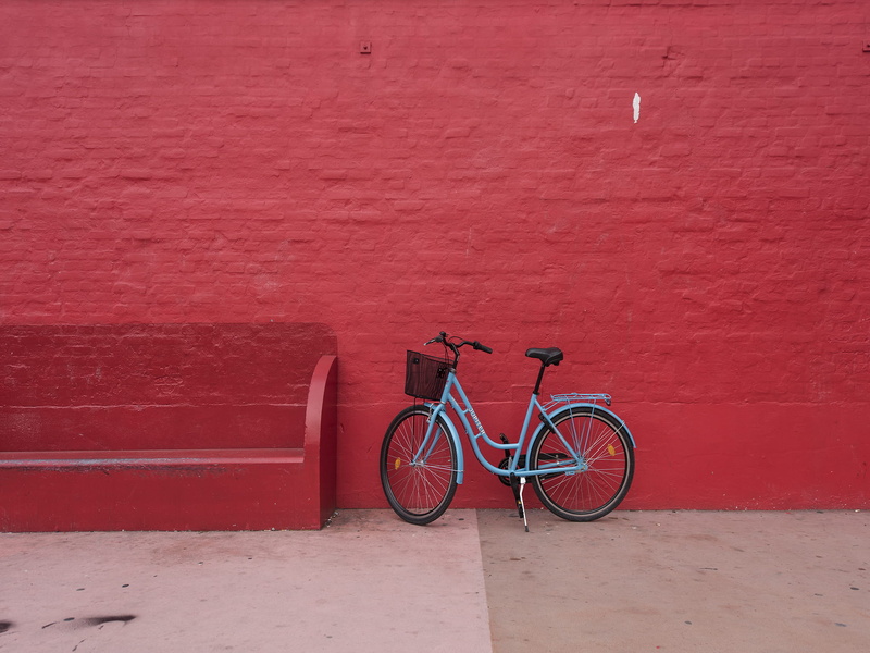 mode of transportation, bicycle, parking, wheel, transportation, colorful, footpath, red bench, city bike, red brick wall, red wall, stationary, red, day