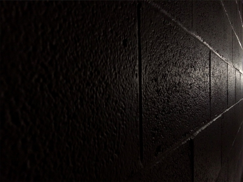 pattern, indoors, concrete, backgrounds, focus on foreground, wall - building feature, cellar, black color, dark, untitled, night, architecture, no people