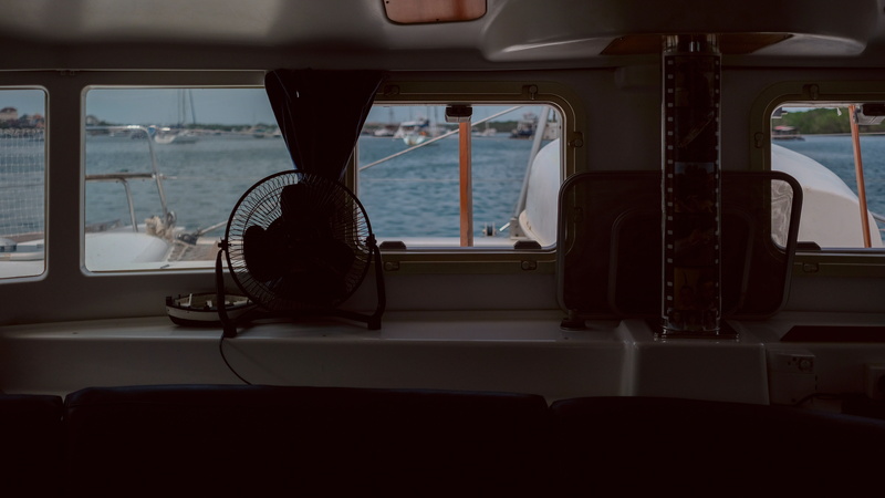 window, luxury, water, inside, nature, no people, powerboat, 5K, table, fan, absence, windshield, control, glass - material, low, ocean, boat, vehicle seat