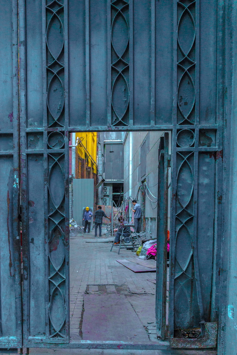 city, transportation, no people, building exterior, day, built structure, metal, pipe - tube, gray, street, entrance, building, door, wall - building feature