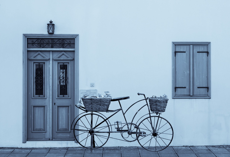 window, cyprus, residential district, snowing, wheels, built structure, closed, blue, bike ornament, architecture, day, outdoors, bicycle with baskets