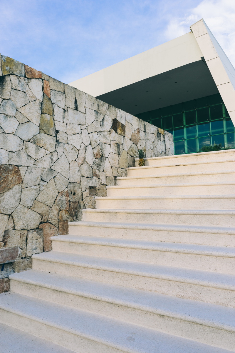 stone wall, handrail, building exterior, banister, empty, resort, outdoors, day, stairs, direction, railing, leadership, wall - building feature, 5K, grand sirenis riviera maya resort