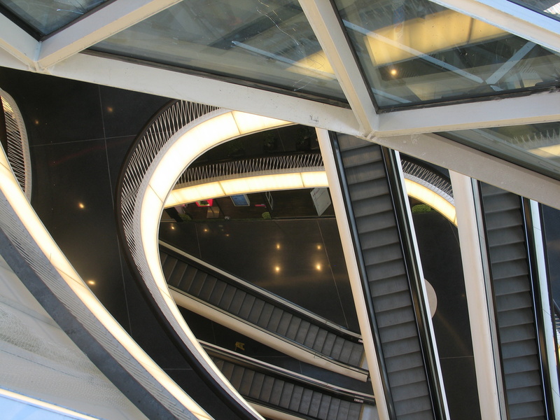 staircase, connection, architecture, bridge - man made structure, reception hall, building exterior, outdoors, about, no people, futuristic, railing, window
