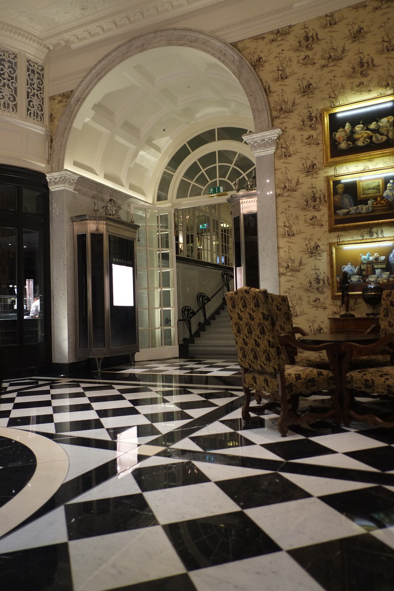 architectural column, entrance, tile, pattern, arch, built structure, hotel, no people, indoors, lobby, seat, day, arcade, tiled floor, architecture, foyer