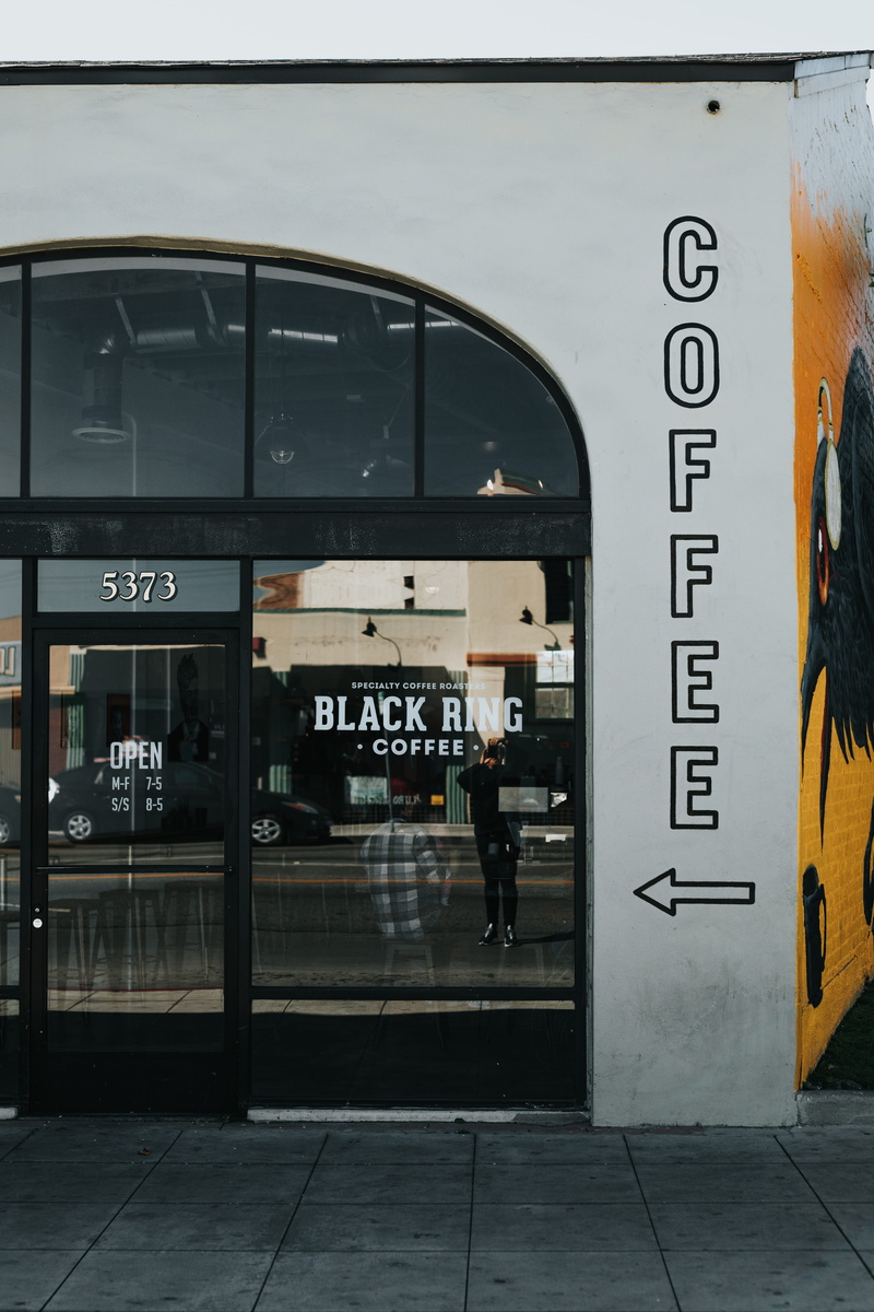 built structure, shop, script, urban, building, one person, people, public transportation, inside, cafe, sign, western script, non-western script, railroad station