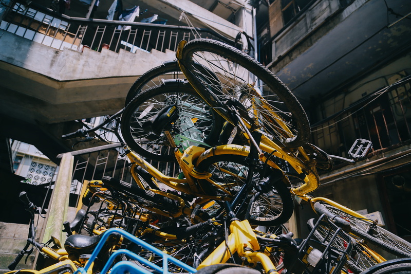 bicycle, obsolete, lot, motor, spoke, bike, mode of transportation, no people, transportation, day, pile, equipment, sports car, staircast, building, metal industry