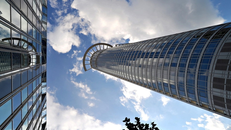 modern, low angle view, tall - high, skyscraper, glass - material, no people, financial district, cloud - sky, building, outdoors, alloy, built structure