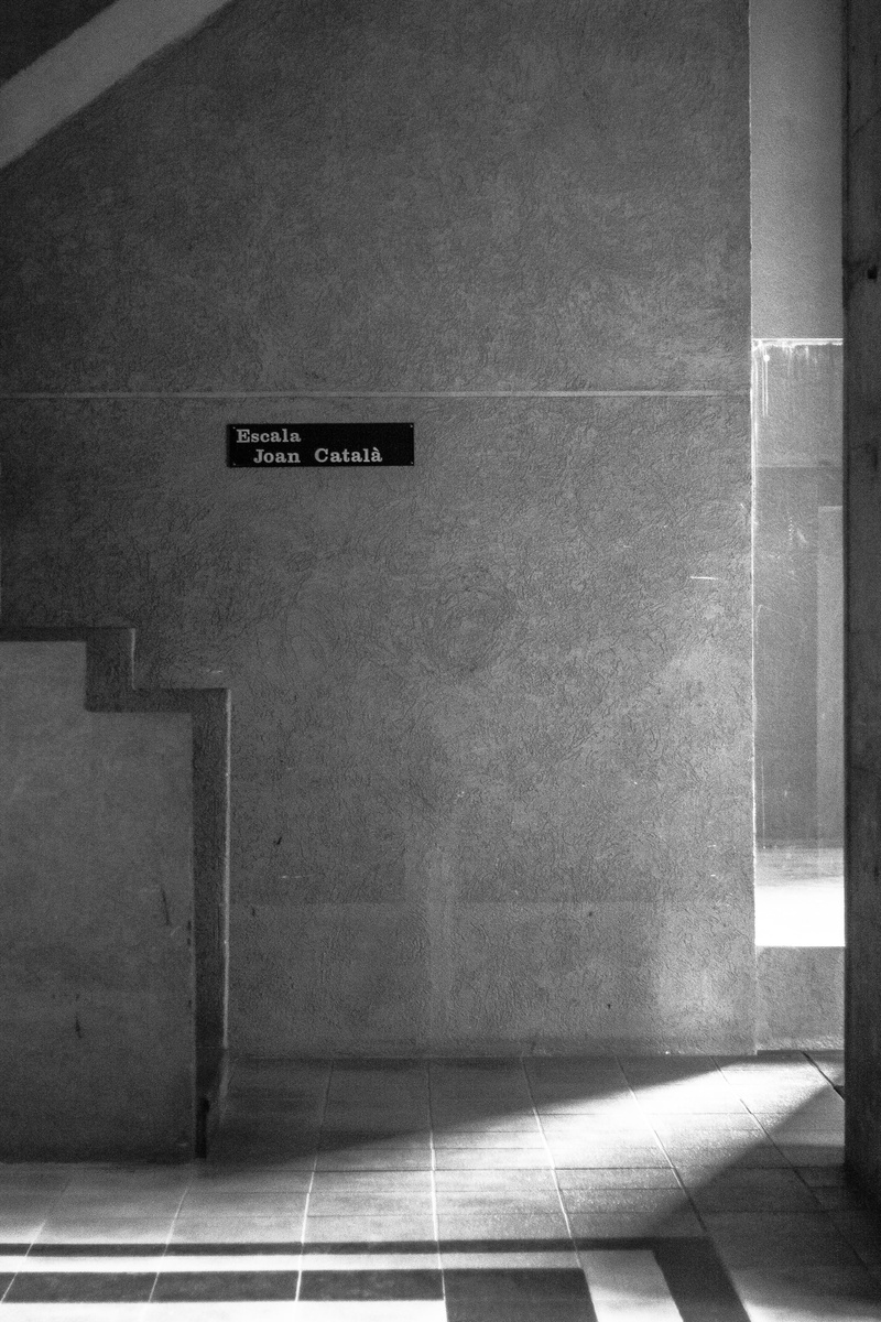 information sign, text, spain, door, built structure, tile, wall - building feature, 4K, flooring, information, direction, tiled floor, barcelona, architecture